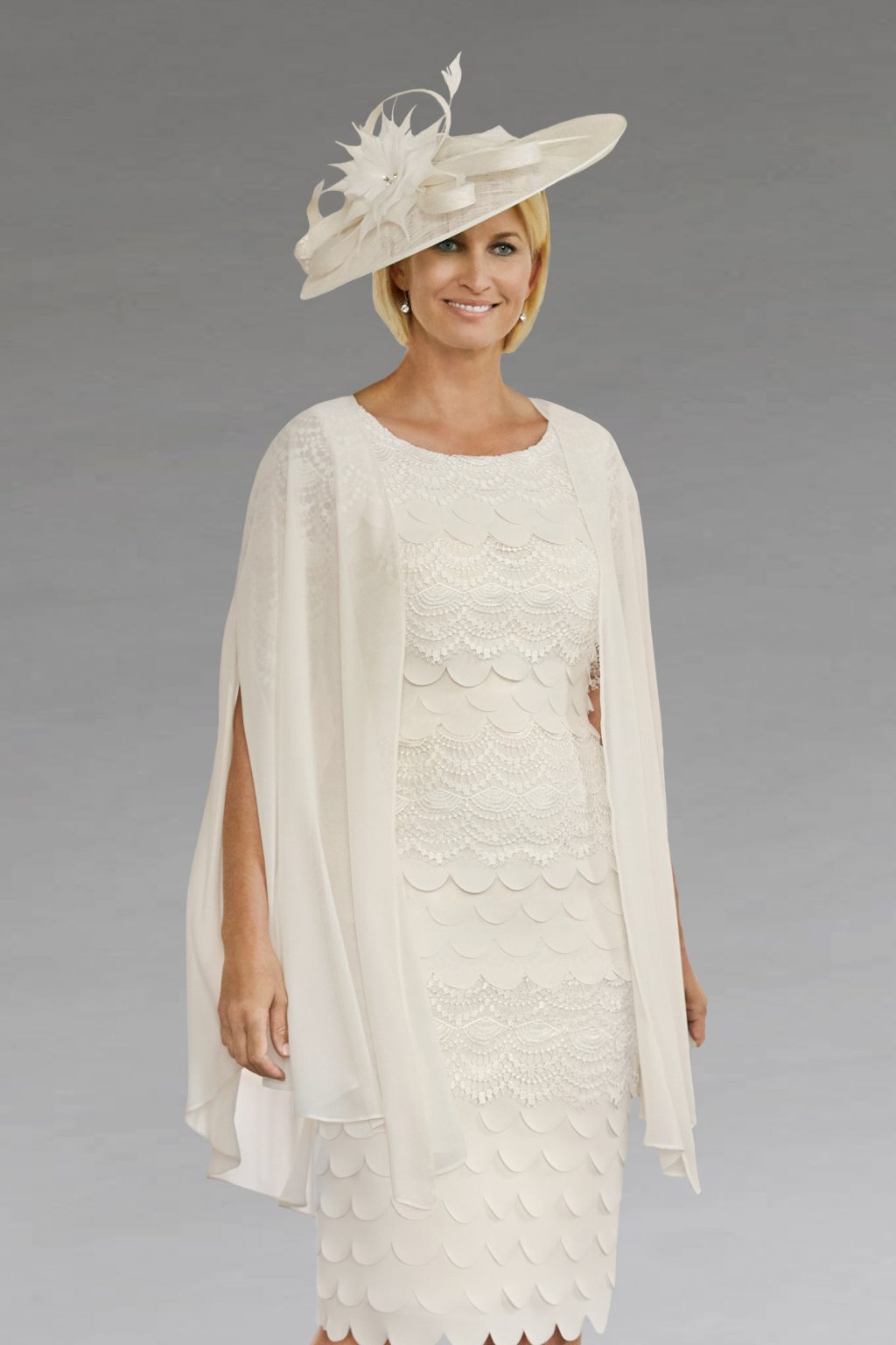 Short fitted dress with matching cape style coat.  29006 - 28954