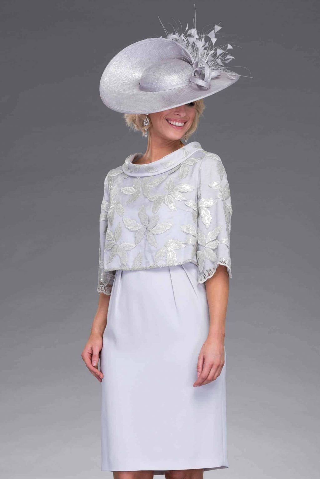 Short fitted dress with overlay. 8390  size 8