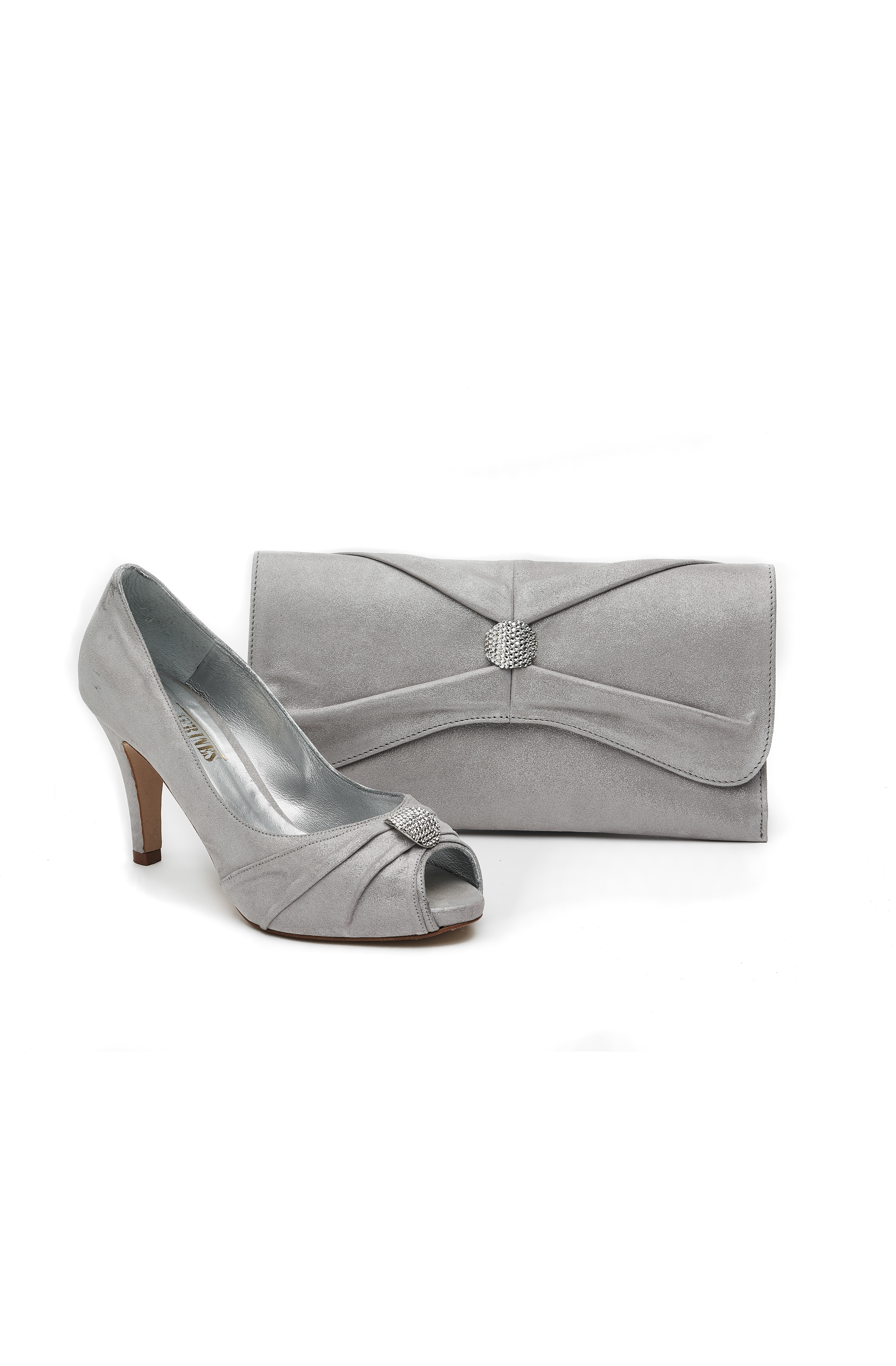 white heels and clutch bag