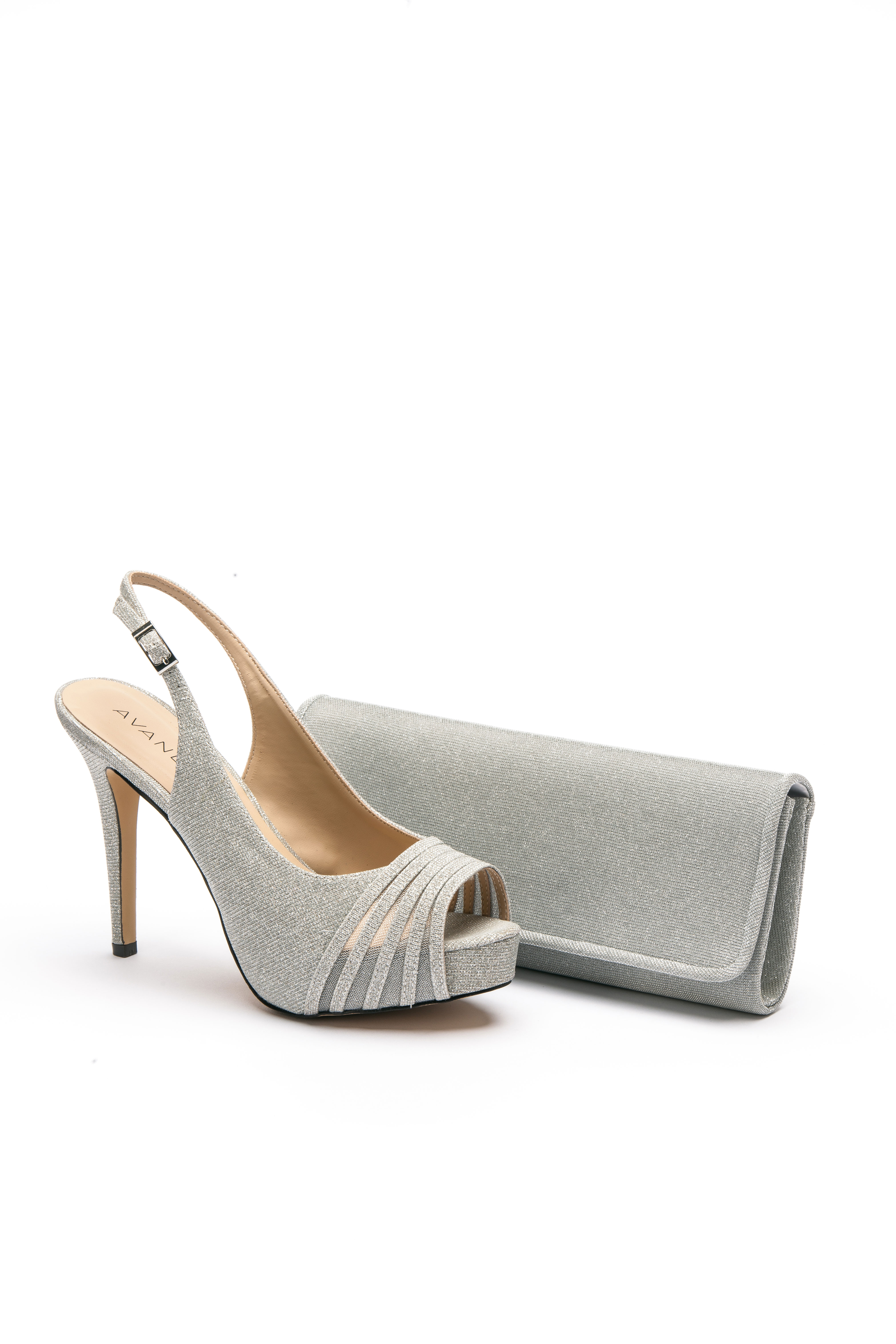Glittering High Heel Shoes With A Matching Purse Displayed On Grey