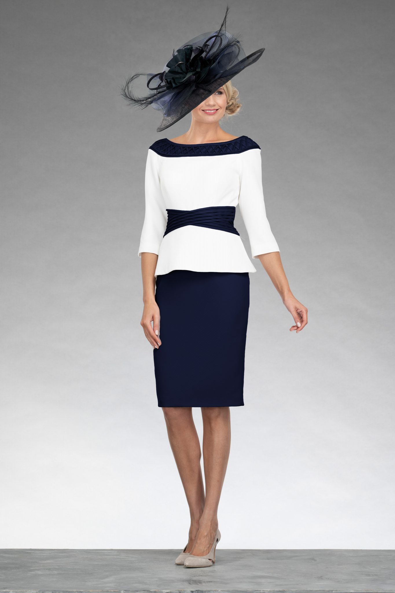 Short fitted dress with peplum. 008505 - Catherines of Partick