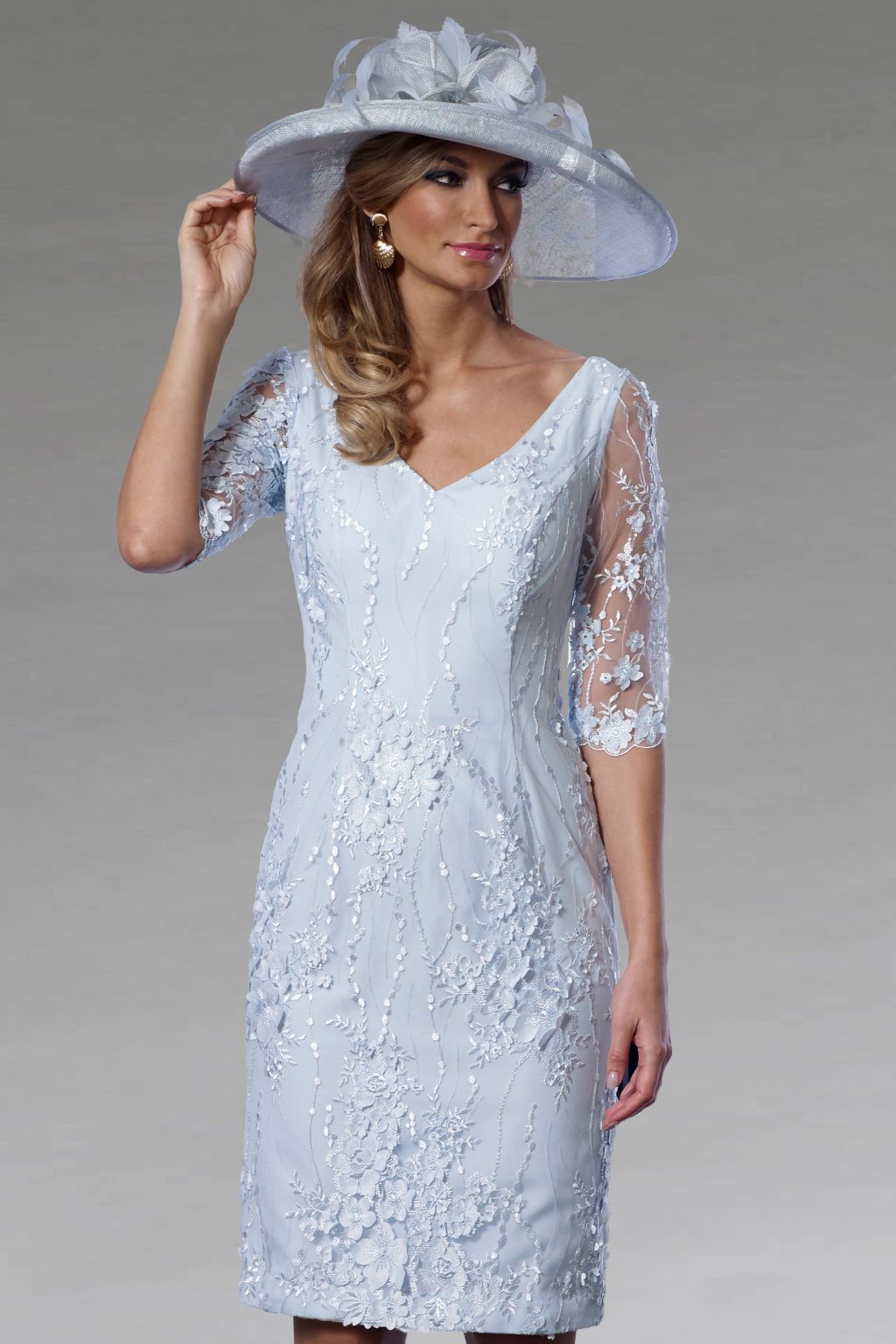 Short fitted lace dress with sleeves.  VO5000