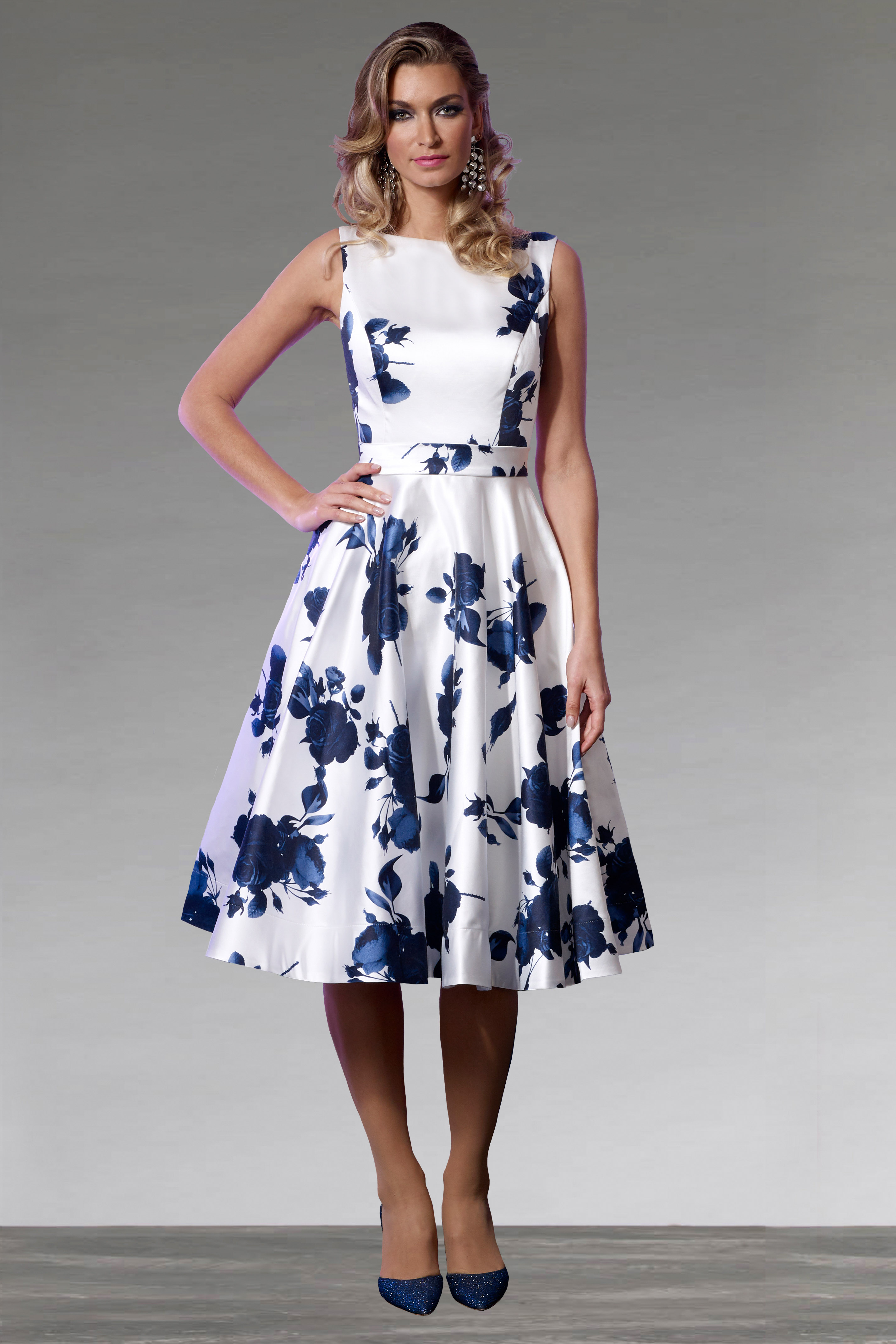 Short floral dress with full skirt. VO4650 - Catherines of Partick