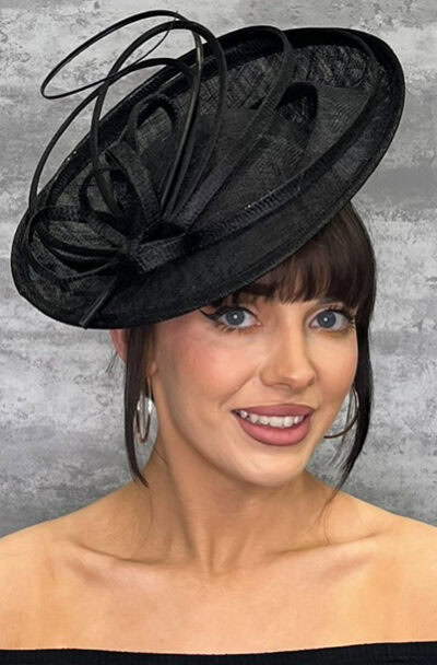 Elegant black saucer style hat with decorative loops and netting for women.