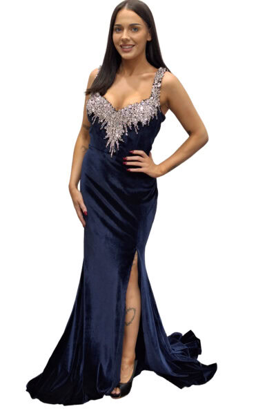 Full-length navy velvet dress with silver embellishments and a thigh-high slit.