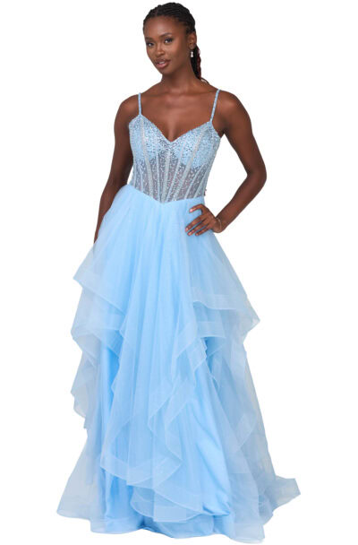 A woman in a light blue tiered tulle gown.