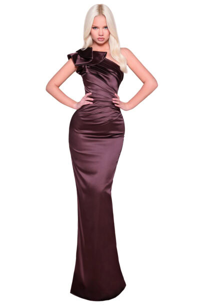 Blonde model in a one-shoulder brown satin evening gown.