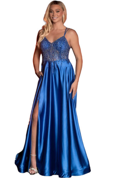A smiling woman wearing an elegant blue evening gown.