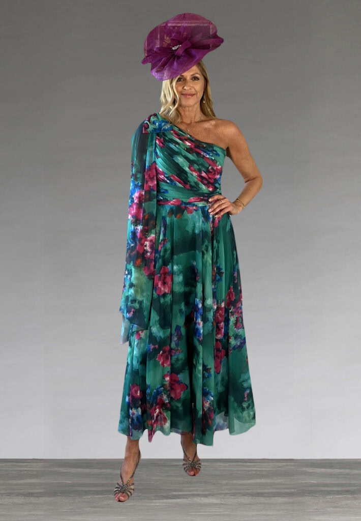 Elegant floral chiffon dress with one shoulder design and matching hat.