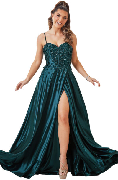 A woman posing in a teal satin evening gown.
