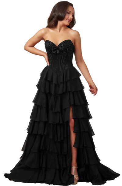 Woman modelling a black strapless tiered ruffle ball gown.