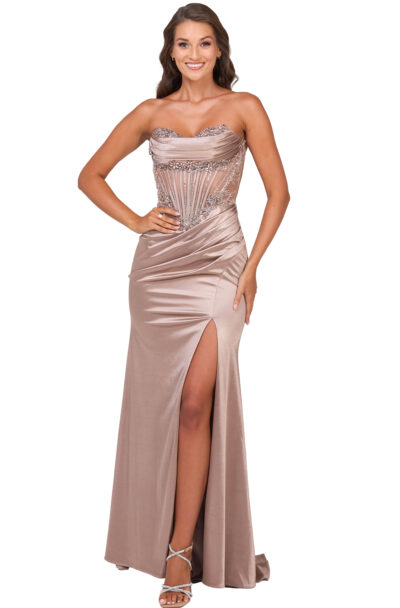 Woman in a taupe satin gown with embellished corset.