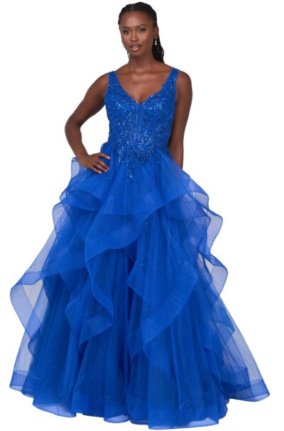 Model wearing a royal blue embellished ruffled ball gown.