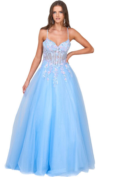 A woman wearing a light blue embroidered ball gown.