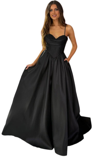 A woman wearing a black satin corset ball gown.