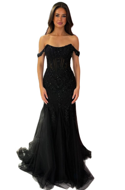 A woman wearing a black off-the-shoulder beaded mermaid gown.