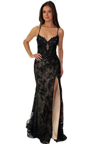 Woman in a black lace evening gown with thigh split.