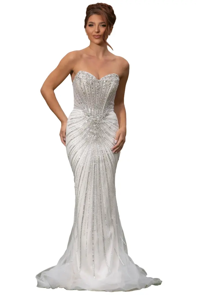Woman in an embellished white strapless mermaid gown.
